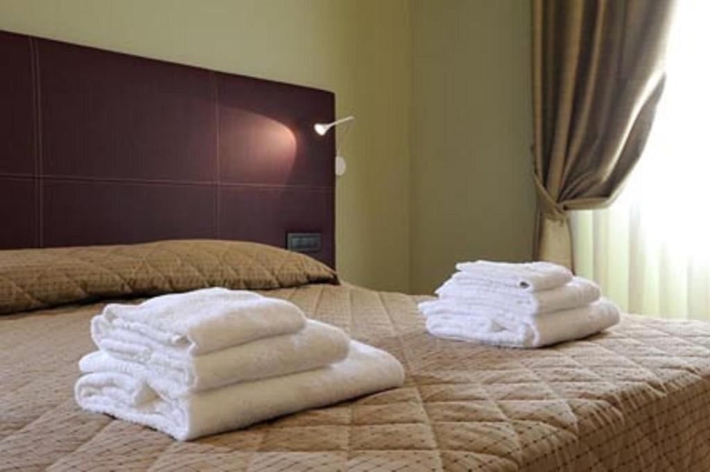 Magione Papale Relais Ξενοδοχείο Λ' Άκουιλα Δωμάτιο φωτογραφία